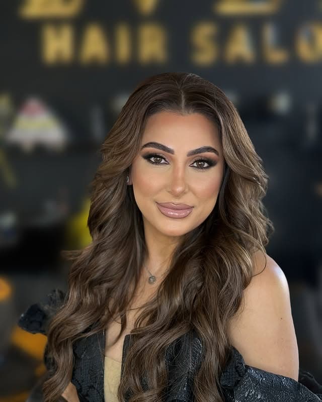 Long brunette balayage with soft waves