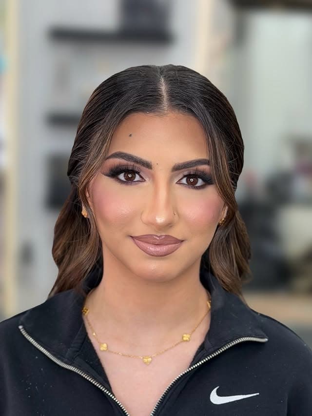 Glam hair and makeup finish